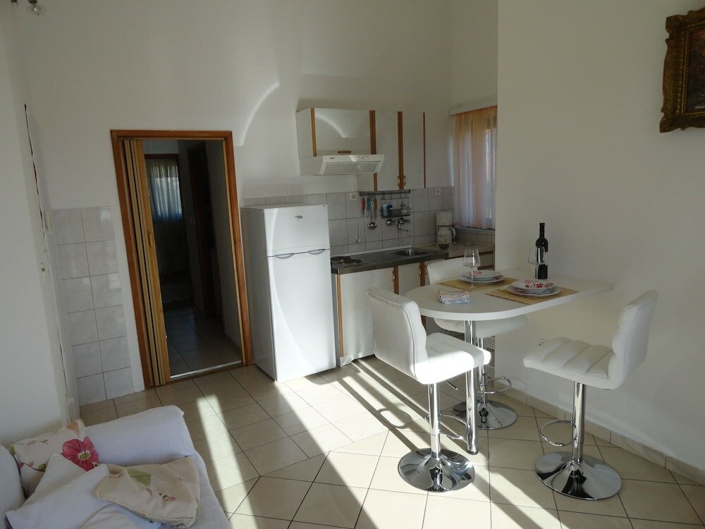 Фото Apartmani Dragović Brodarica