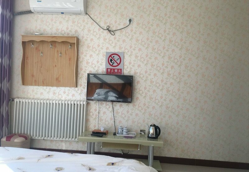Гостиница Nanguan Apartment в Гаоми
