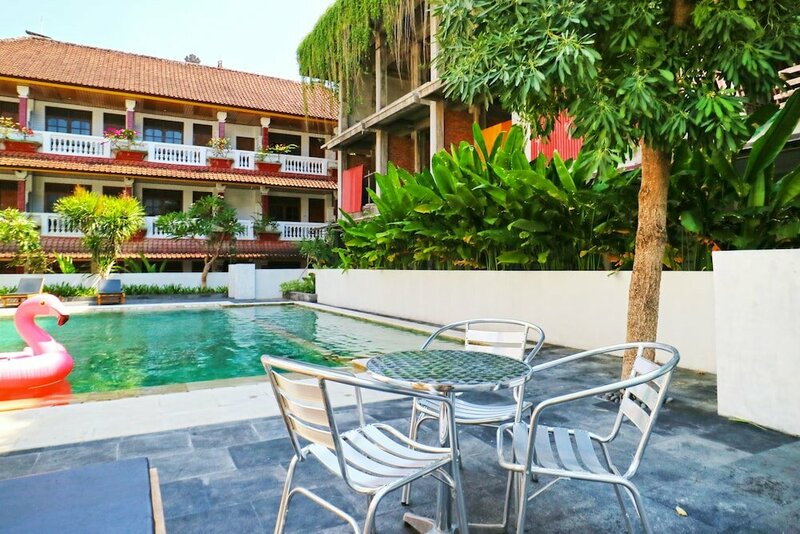 Гостиница Palm Garden Kuta Hotel