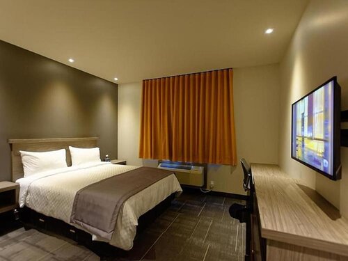 Гостиница Olux Hotel Motel & Suites в Лавале