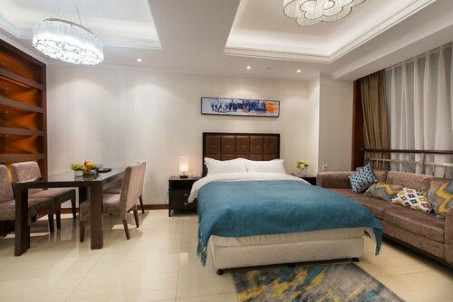 Гостиница Qingdao Jinshan We Holiday Apt Wusi в Циндао
