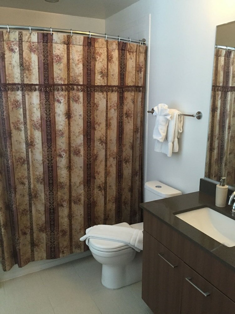 Фото Instrata by Executive Apartments