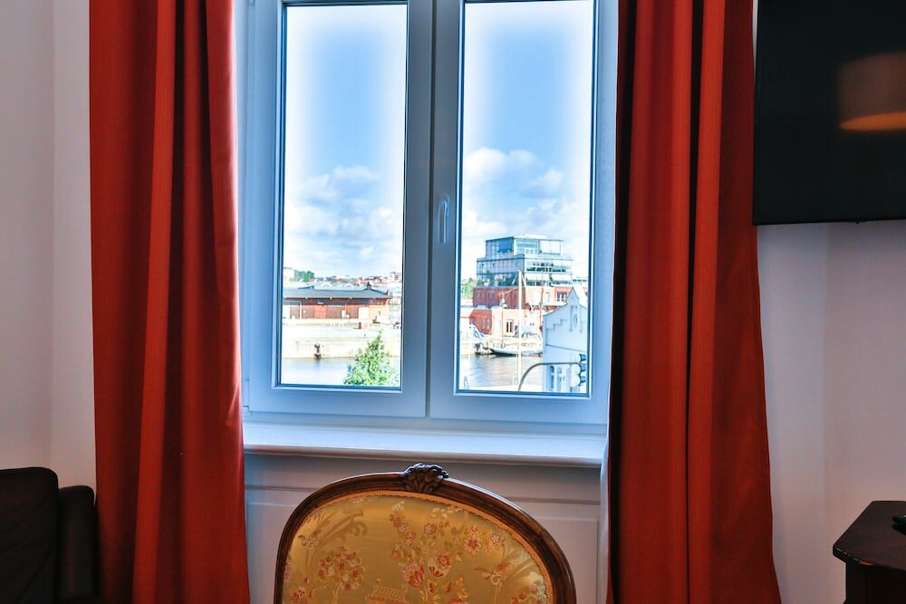 Фото Ferienwohnungen am Holstentor