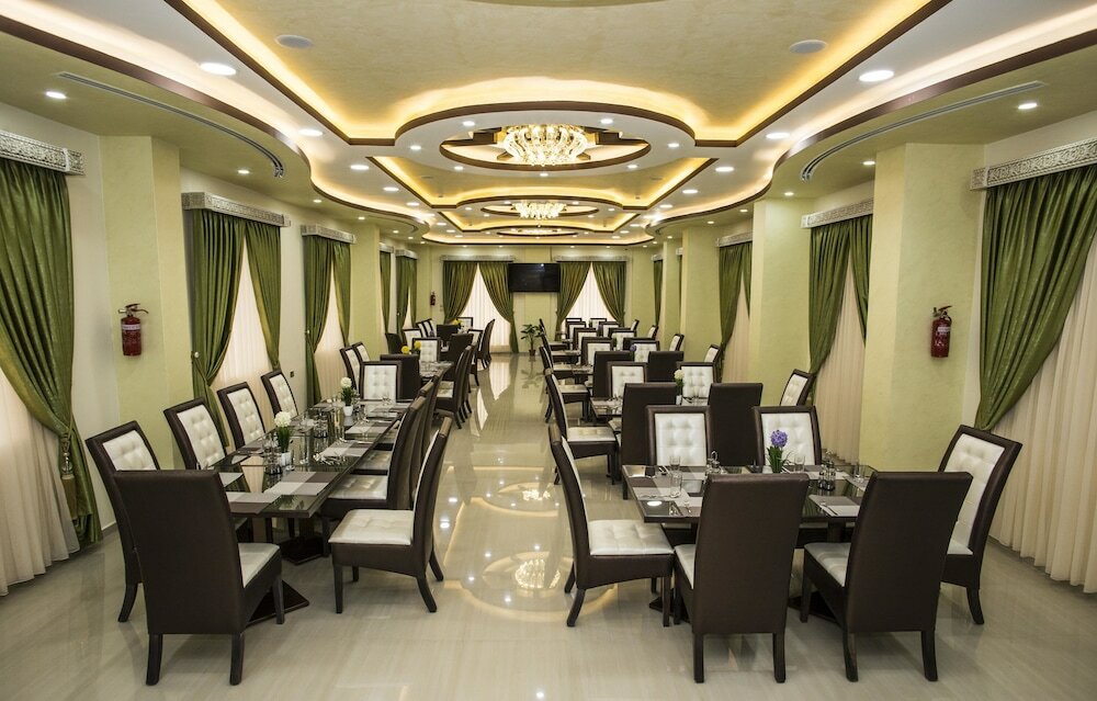 Фото Queen Plaza Hotel