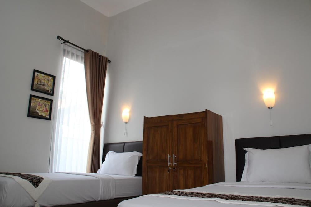 Фото Natura Rumah Singgah Guest House