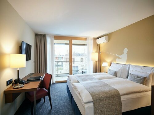 Гостиница Deltapark Vitalresort в Туне