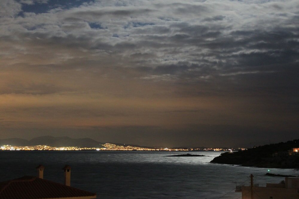 Фото Blue Dolphin Studios & Apartment