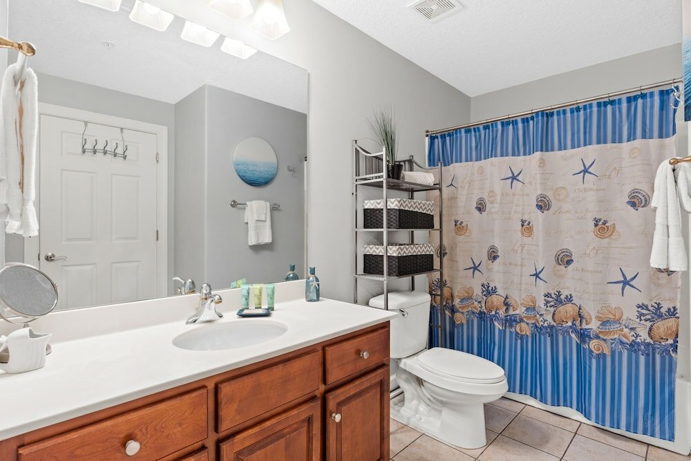 Фото Tropic Winds by Book That Condo