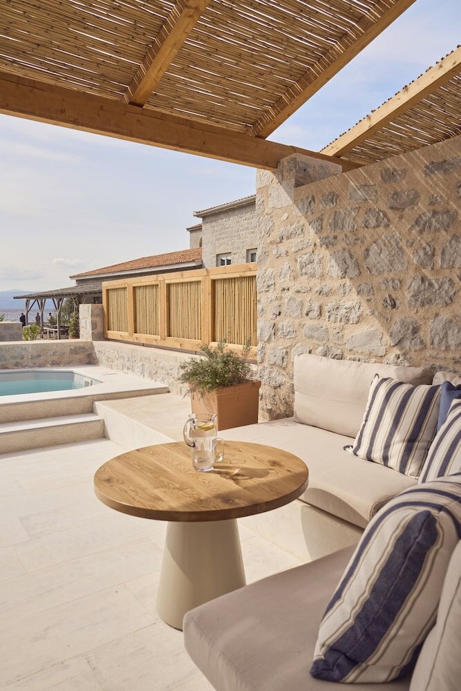 Фото Mandraki Beach Resort - Adults Only