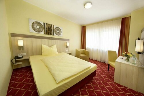 Гостиница Montana Hotel Köln-Bonn Airport в Тройсдорфе