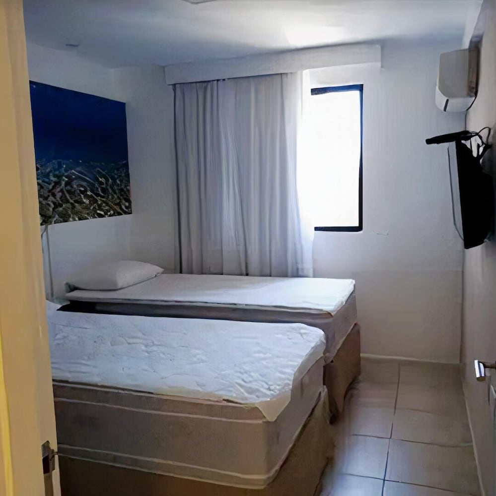 Фото Completo em Hotel Localização Perfeita