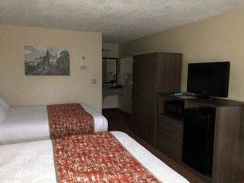 Гостиница Mho Inn & Suites