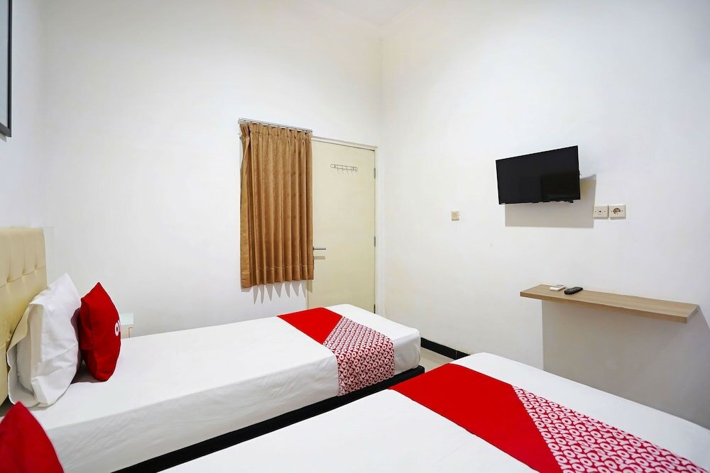 Фото Oyo 91508 Ruby Homestay Syariah