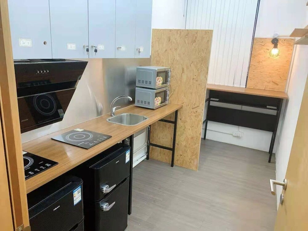 Фото Shingting Living Hotel Apartment