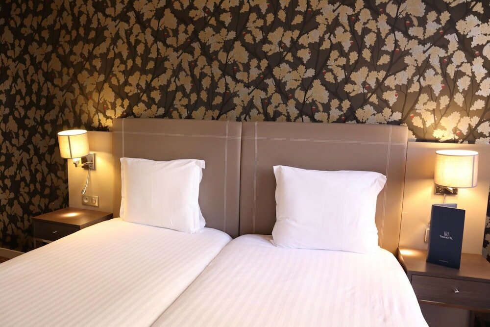 Фото Timhotel Opéra Blanche Fontaine