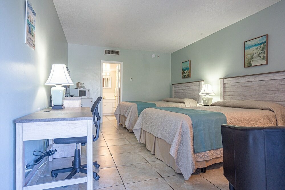 Фото Carriage House Resort Motel