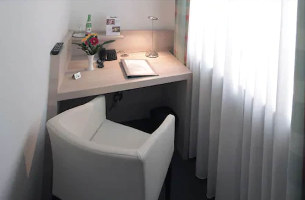 Фото Hotel Am Hofgarten