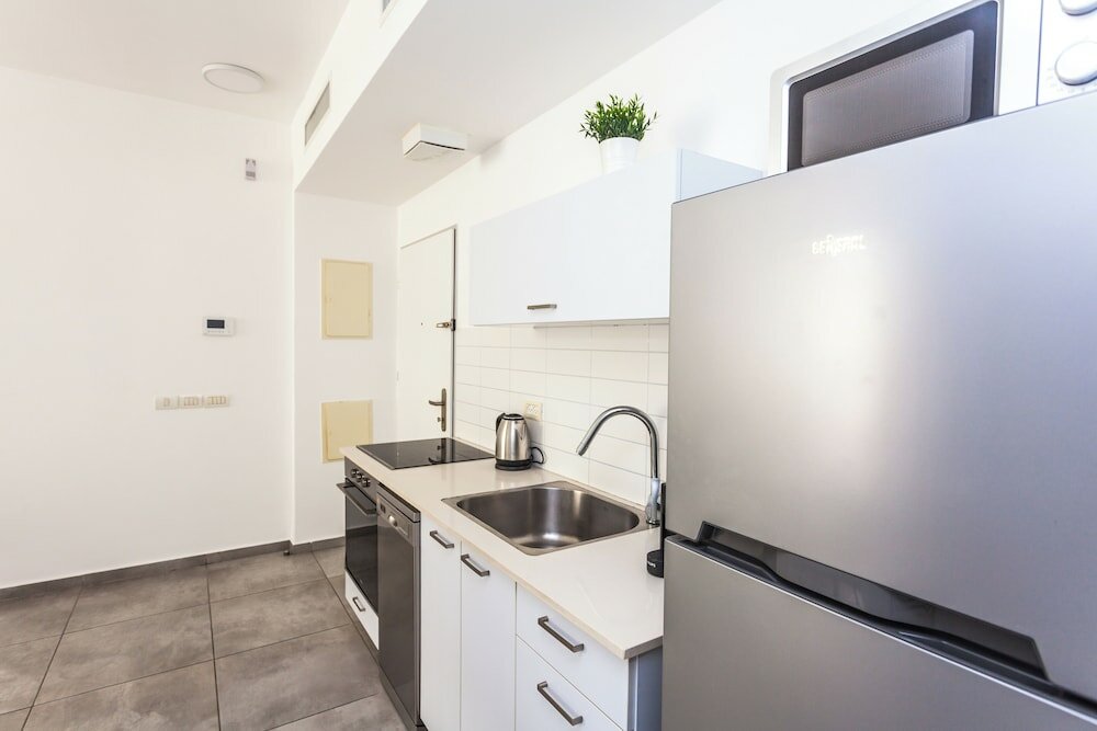 Фото Modern Apartment Walking from the beach