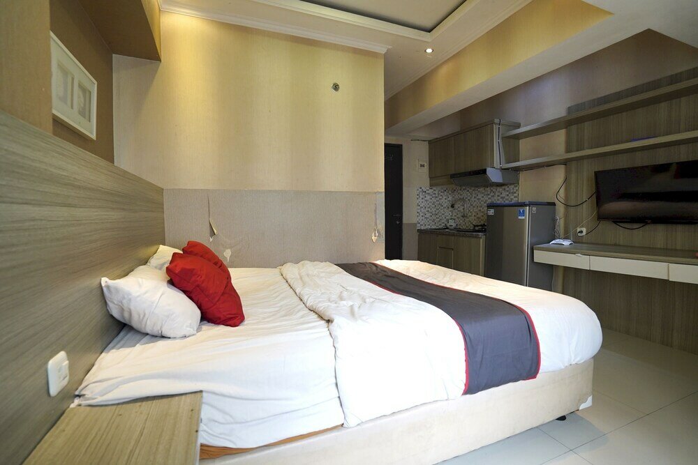 Фото Collection O 92981 Apartemen The Jarrdin