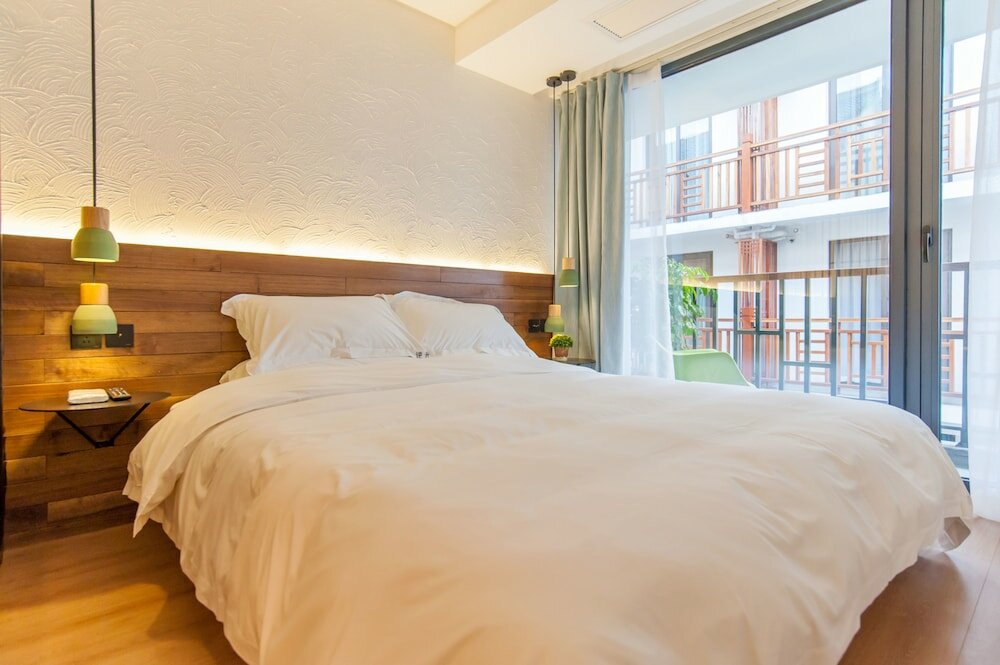 Фото Hangzhou Backlighting Inn