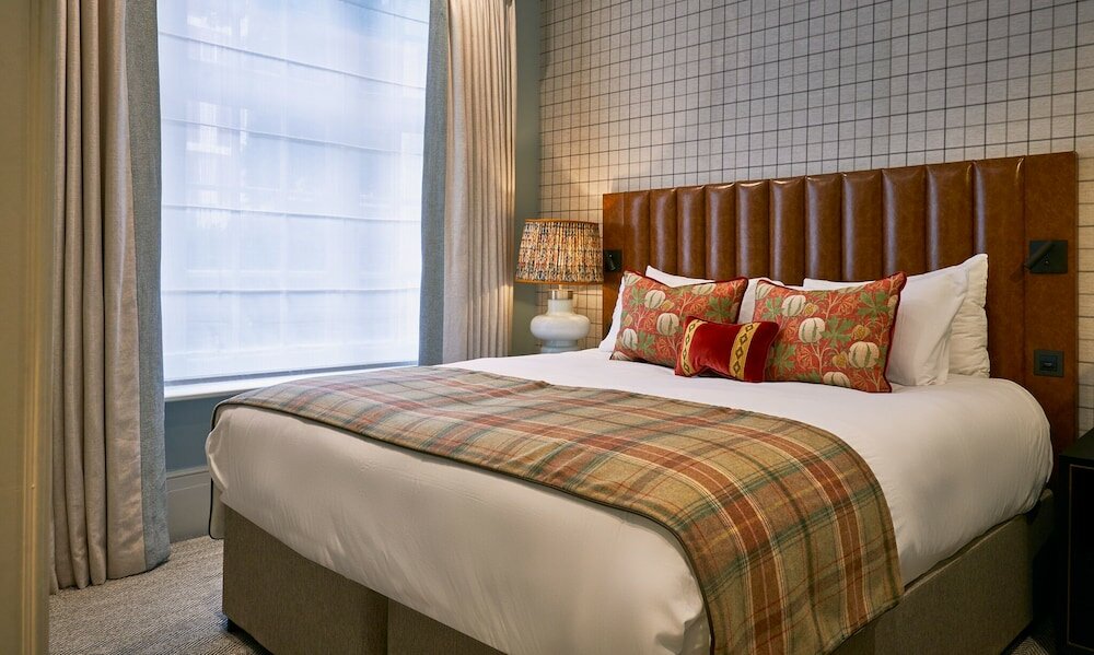 Фото Tophams Hotel