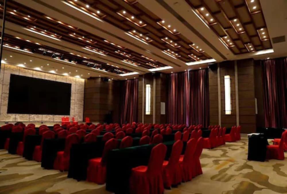 Фото Auden International Hotel