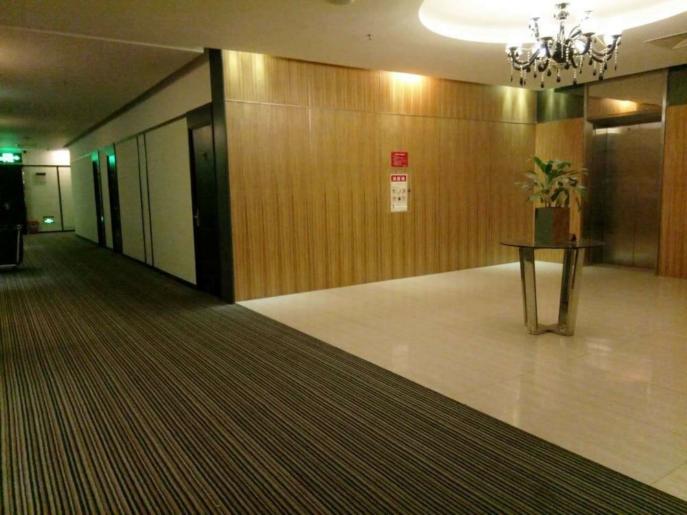 Фото KaiMan Hotel