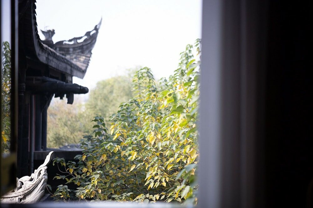 Фото Xishu Garden Inn