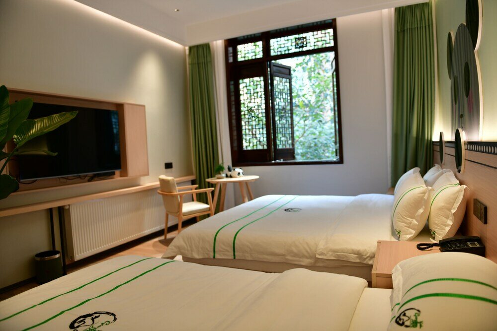 Фото Xishu Garden Inn