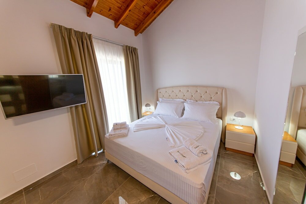 Фото Santa Oliva Suites