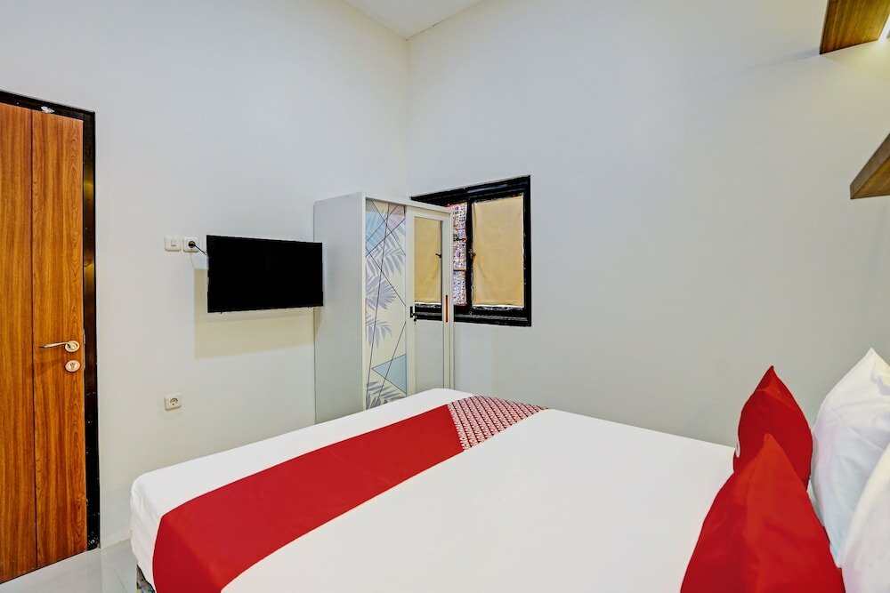 Фото OYO 92435 Sunlo Cozy Home Family Homestay Syariah