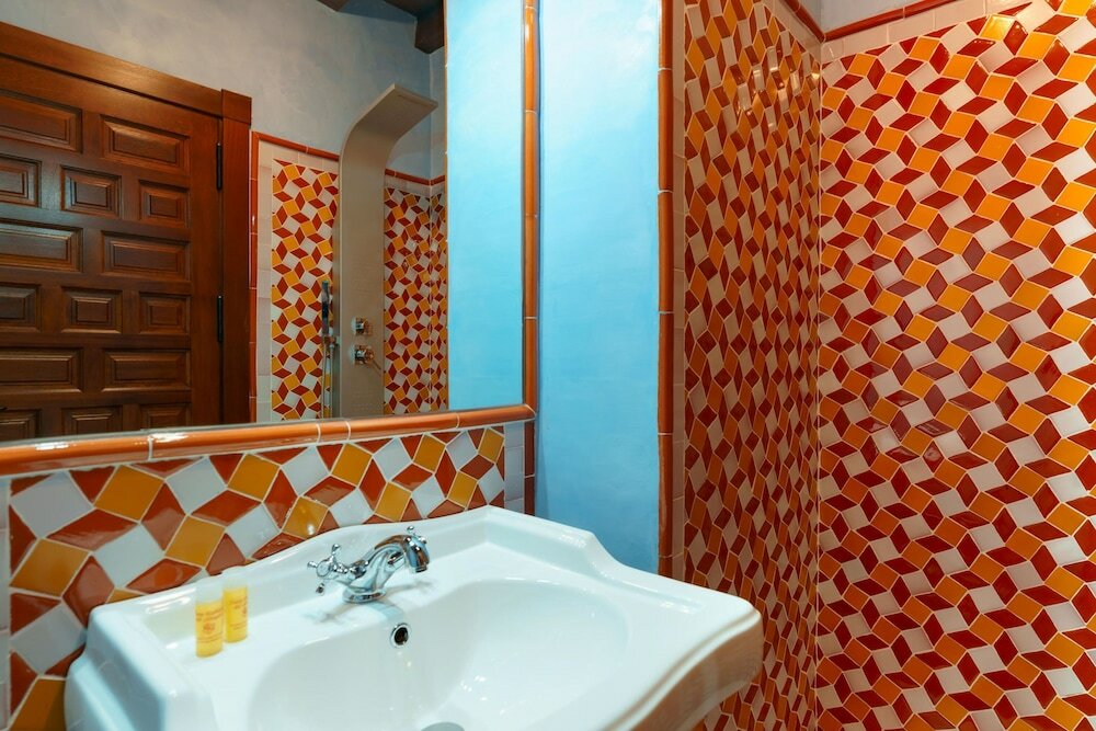 Фото Suites Casa De Las Columnas