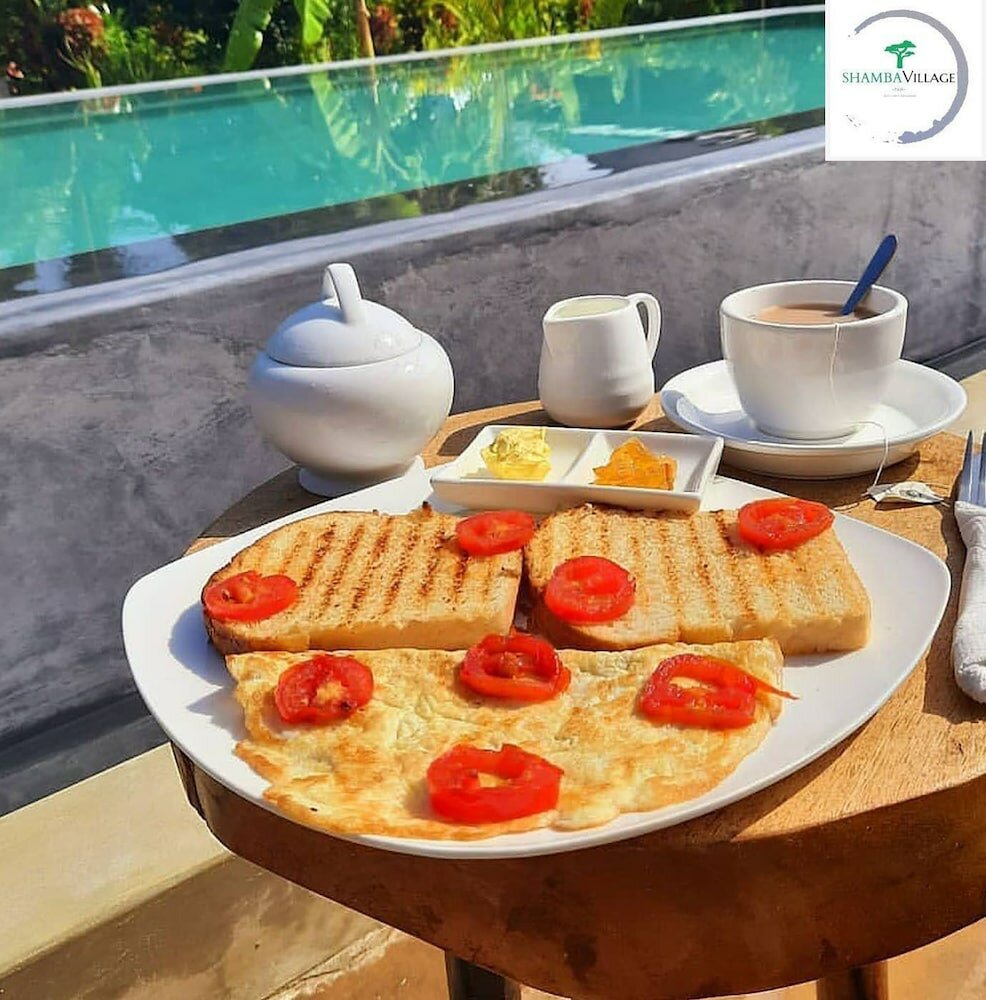 Фото Shamba Village Hotel