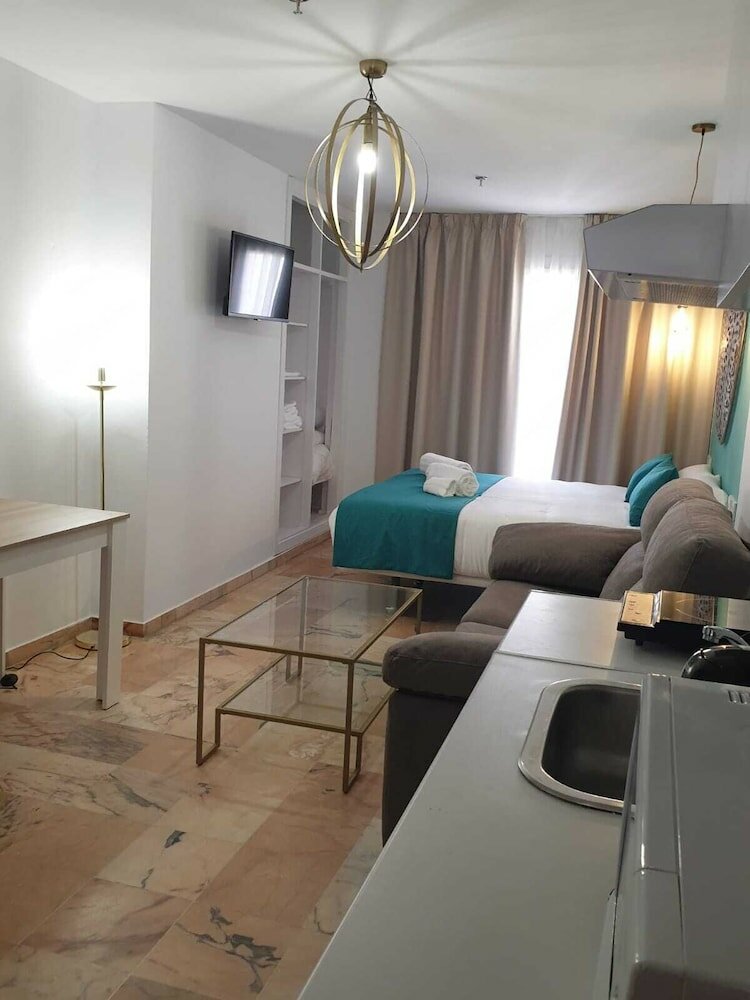 Фото Hotel y Apartamentos Doña Lola