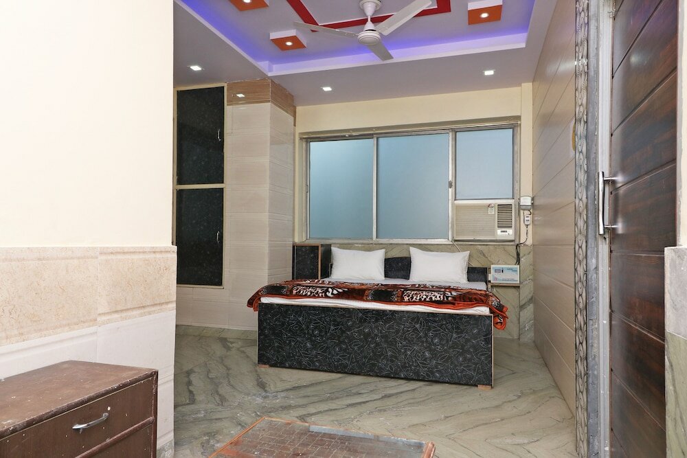 Фото Spot On 43881 New Era Guest House