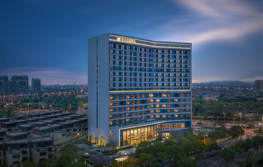 Фото New Century Hotel Zhenhai