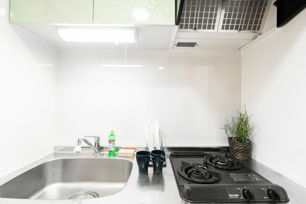 Фото Shinsaibash East Nana Apartment · Junan