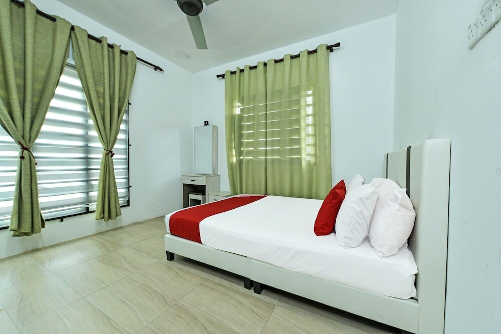 Фото Oyo Home 90682 Liliz Mambang Farmstay