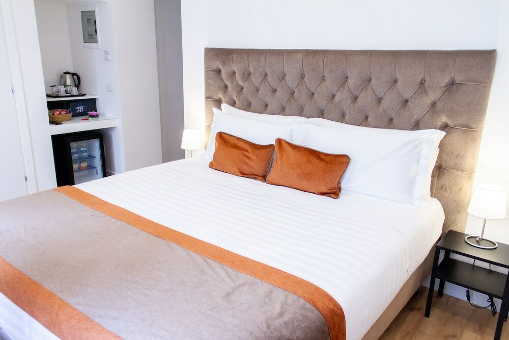 Фото Home at Rome Vatican Suites