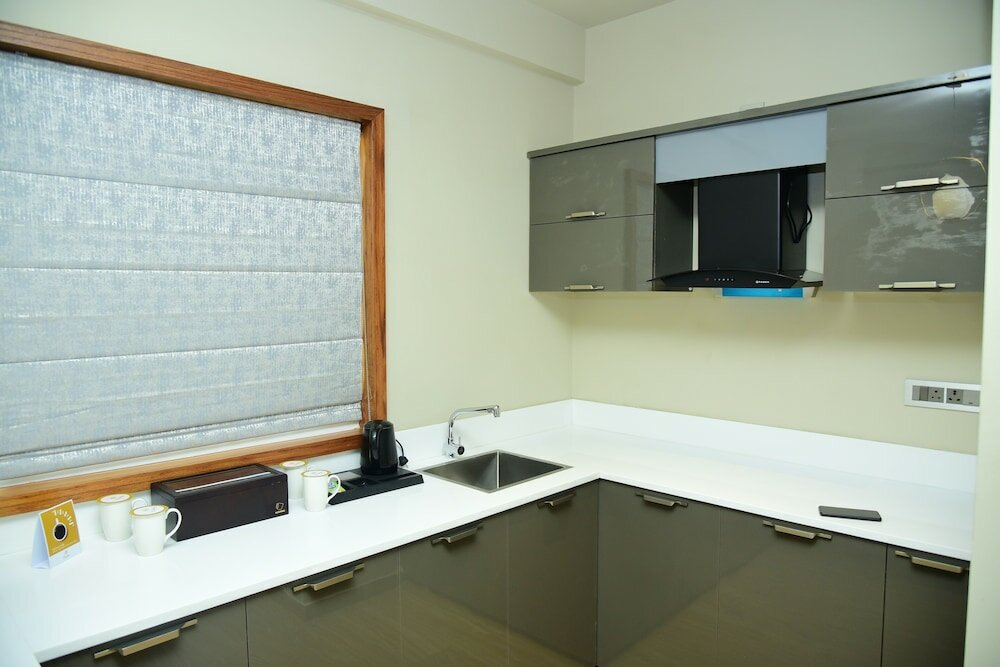 Фото Lazdana Hotel Bangalore