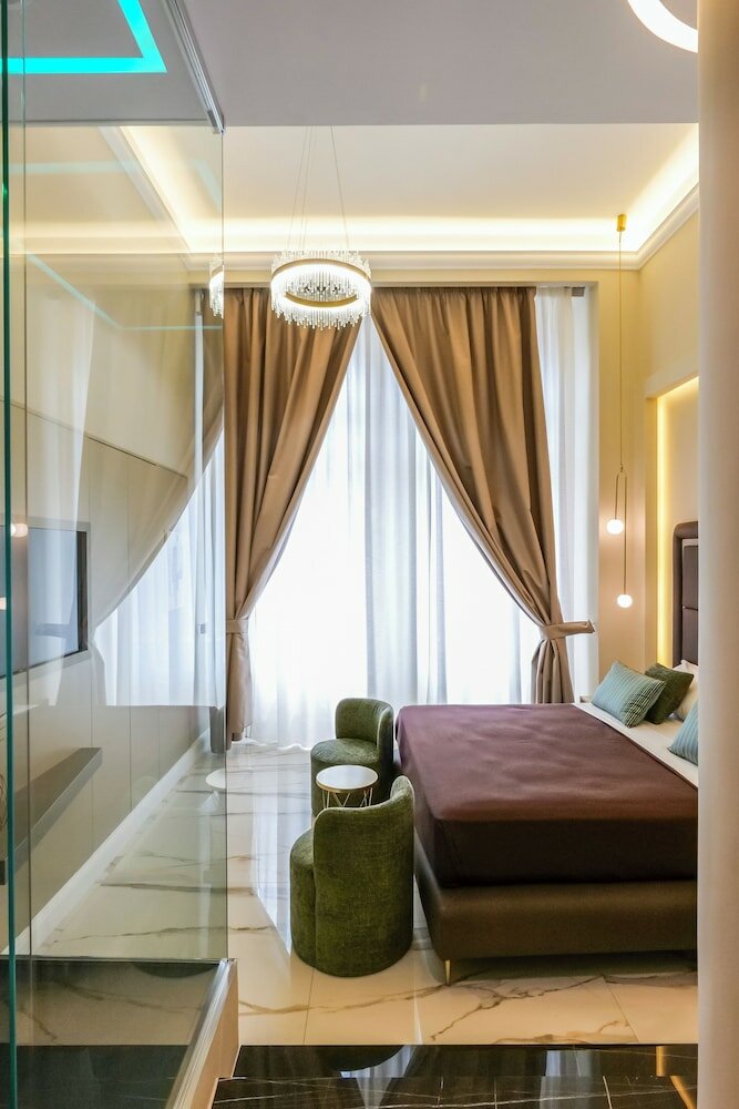 Фото Maison San Carlo Luxury Suites