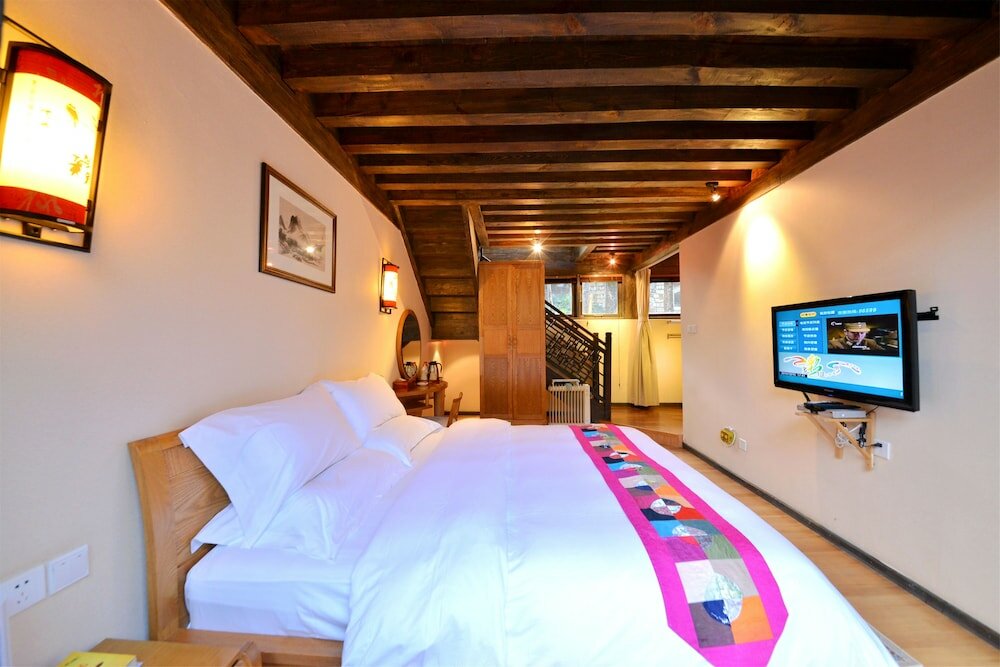 Фото Lijiang Shuhe Youyiju Private Club