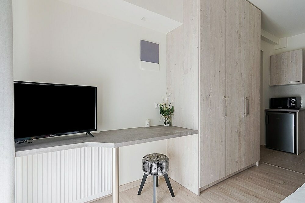 Фото Modern Athens Studio by Cloudkeys