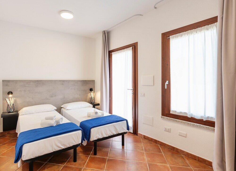 Фото Residence with pool in Isola Rossa