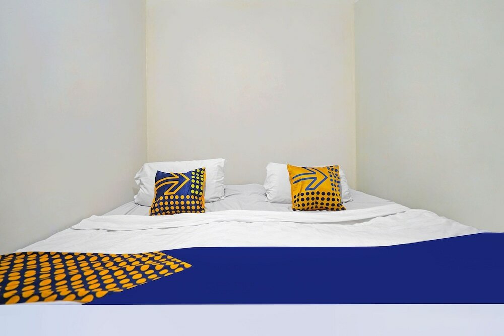 Фото Spot On 91783 Urban Syariah Residence