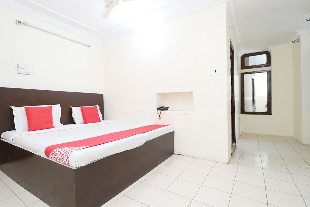 Фото Oyo 30274 Temple City Guest House