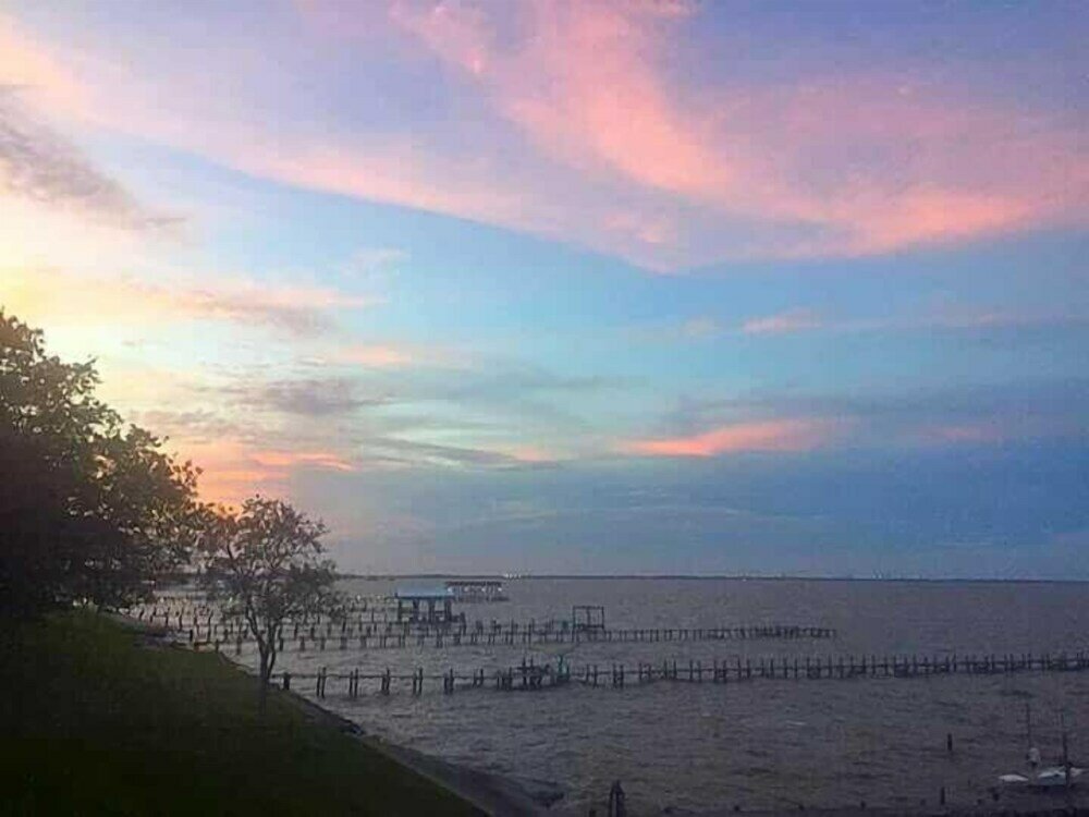 Фото Come Friday Cottages on the Bay