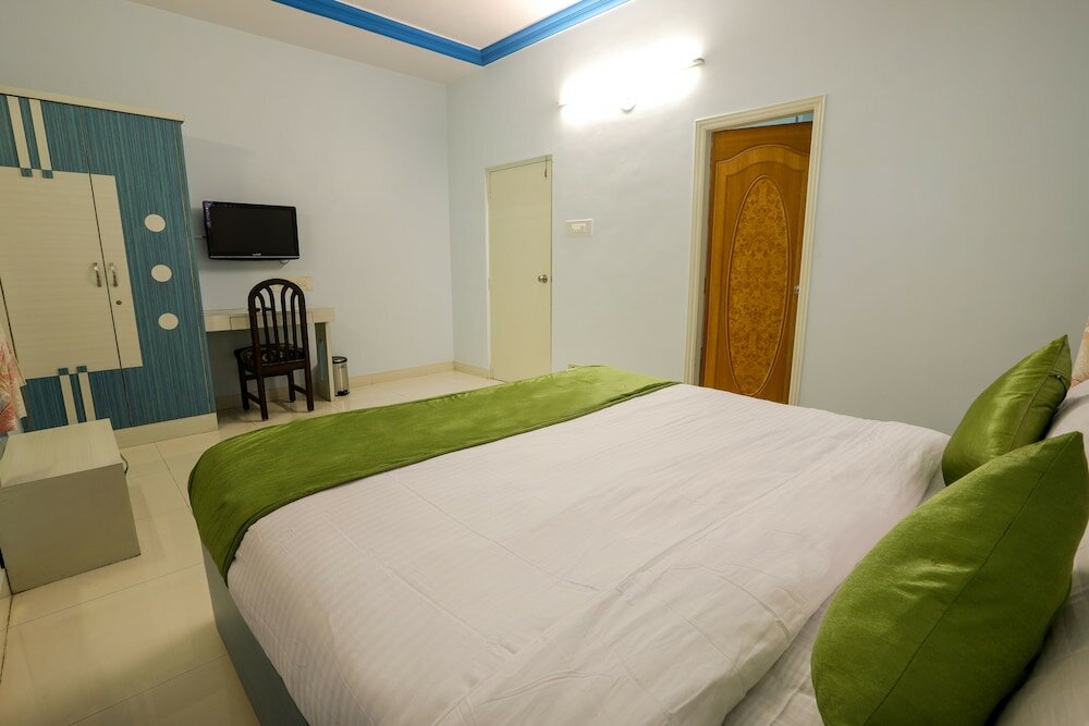 Фото Oyo 10031 Wind Chimes Boutique Guest House