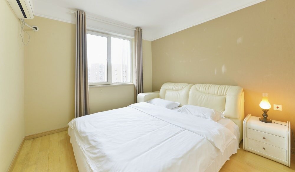 Фото Wanke City International Apartment