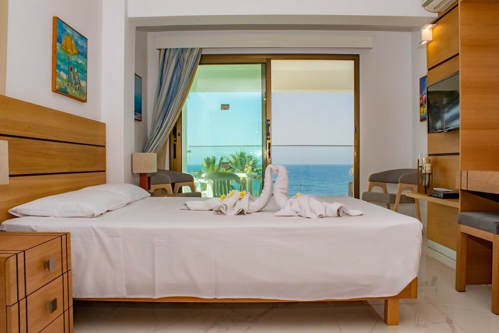 Фото Rododafni Beach Apartments